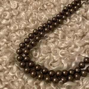 Long faux pearl necklace